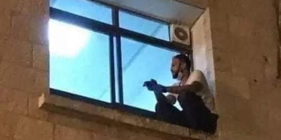 Young man scales hospital wall every night to watch over his dying mum